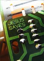 'Jesus Saves' printed on a circuit board